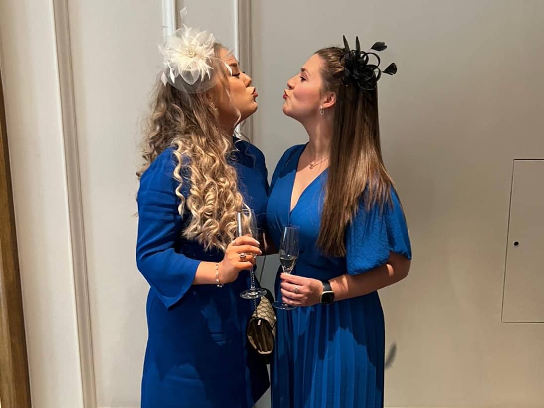 Cambridgeshire Contemporary Celebrant, Jemma from Love Jemma ceremonies with her sister in royal blue outfits at a wedding.