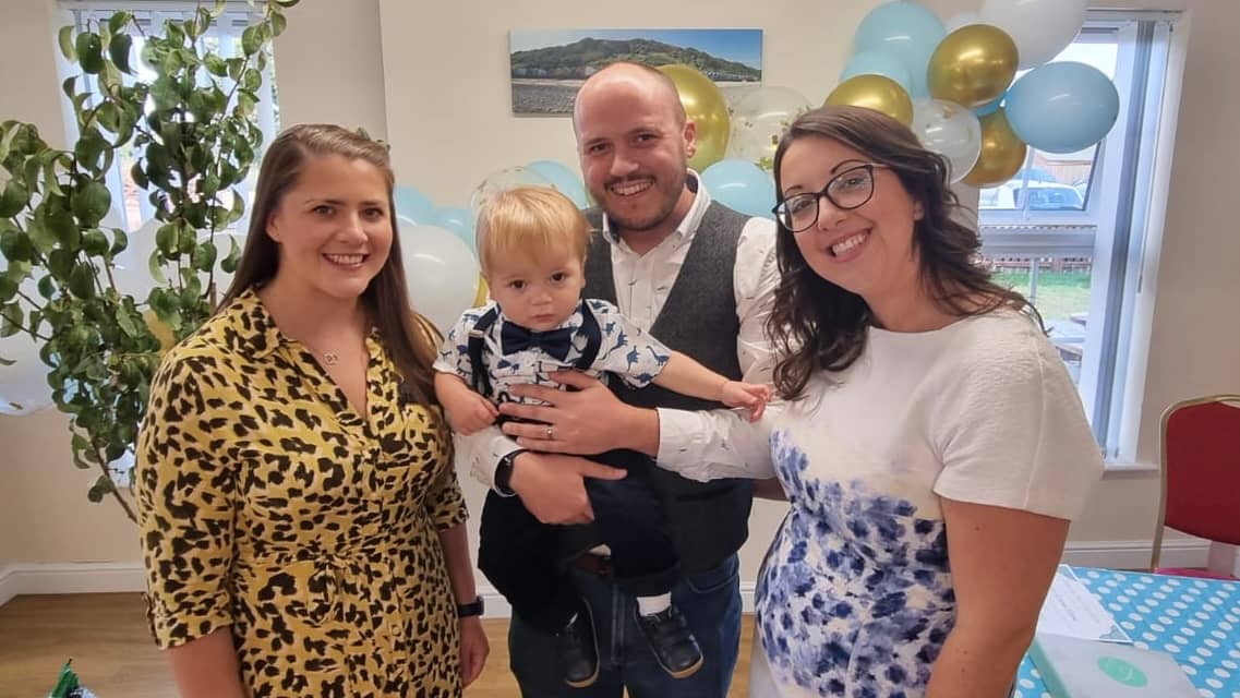 Love Jemma Celebrant with a family after a unique naming ceremony, helping to celebrate a first birthday